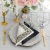 serwetki-dekoracyjne-biale-czarno-zloty-ornament.webp